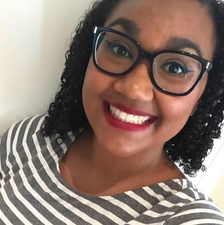 a headshot of Olivia